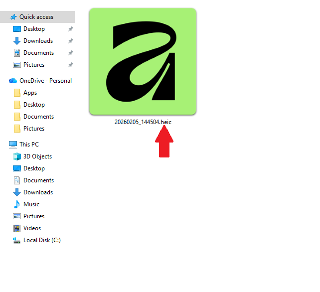 Example of a HEIC file in a folder: file icon and .heic extension, showing how iPhone photos appear on a computer.